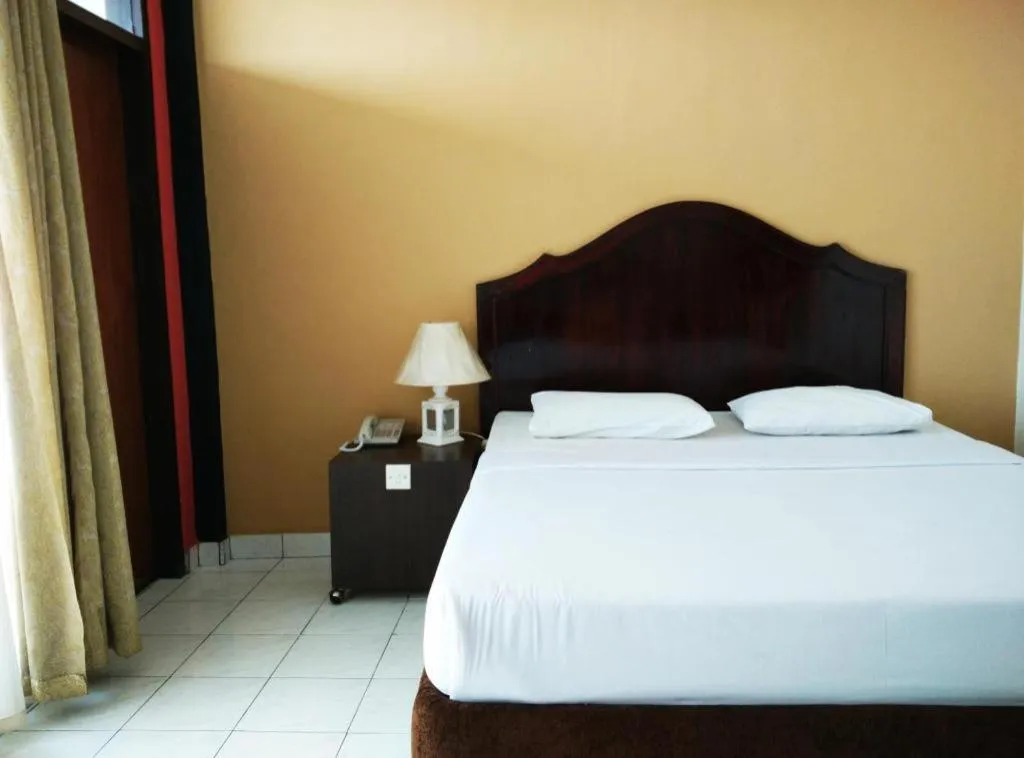 Bed in Hotel Benteng