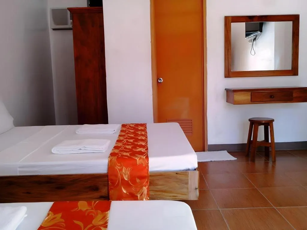 Bed in Anda de Boracay in Bohol Hotel