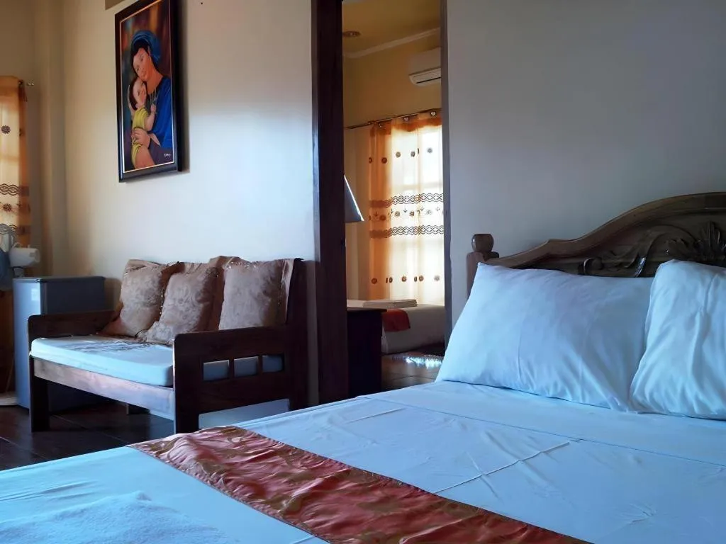 Bed in Anda de Boracay in Bohol Hotel