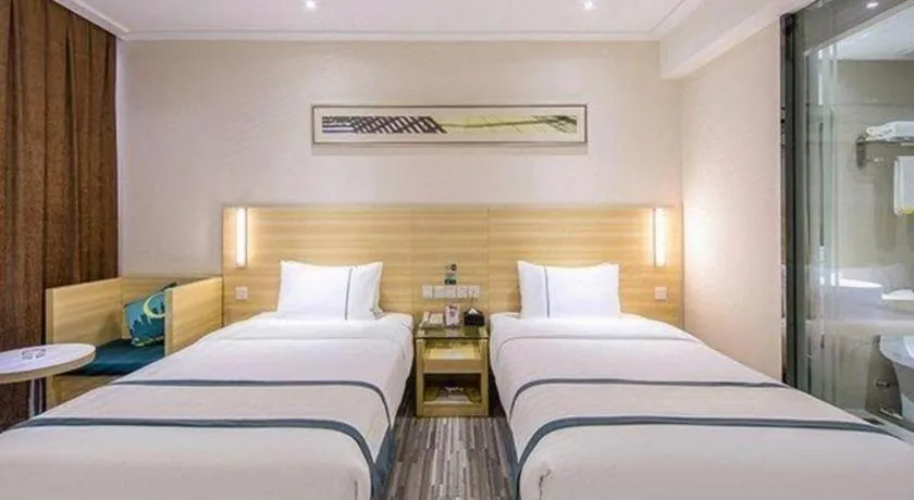 Bed in City Comfort Inn Enshi Shizhou Avenue