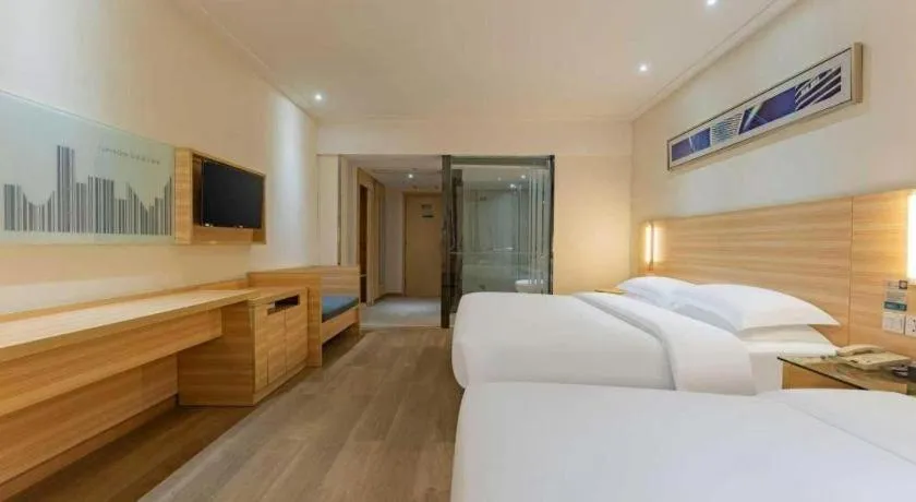 Bed in City Comfort Inn Enshi Shizhou Avenue