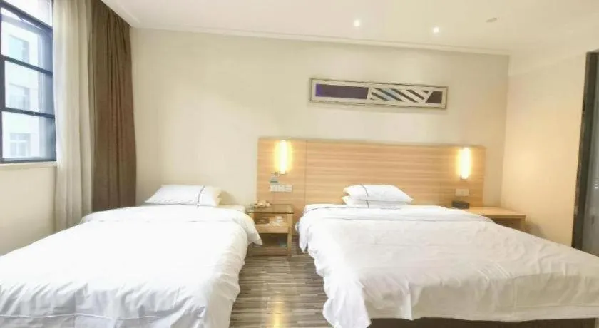 Bed in City Comfort Inn Enshi Shizhou Avenue