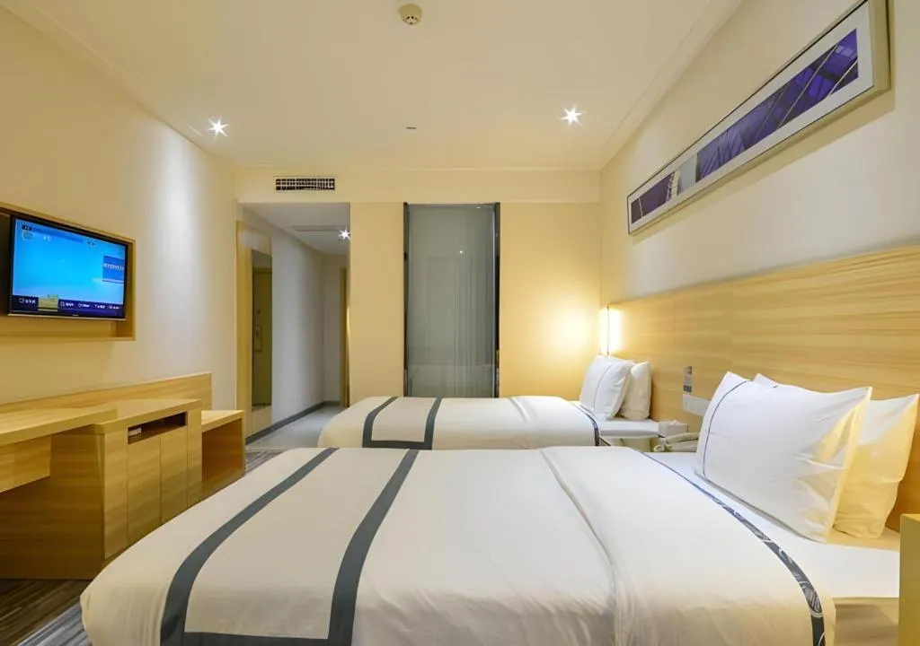 Bed in City Comfort Inn Enshi Shizhou Avenue