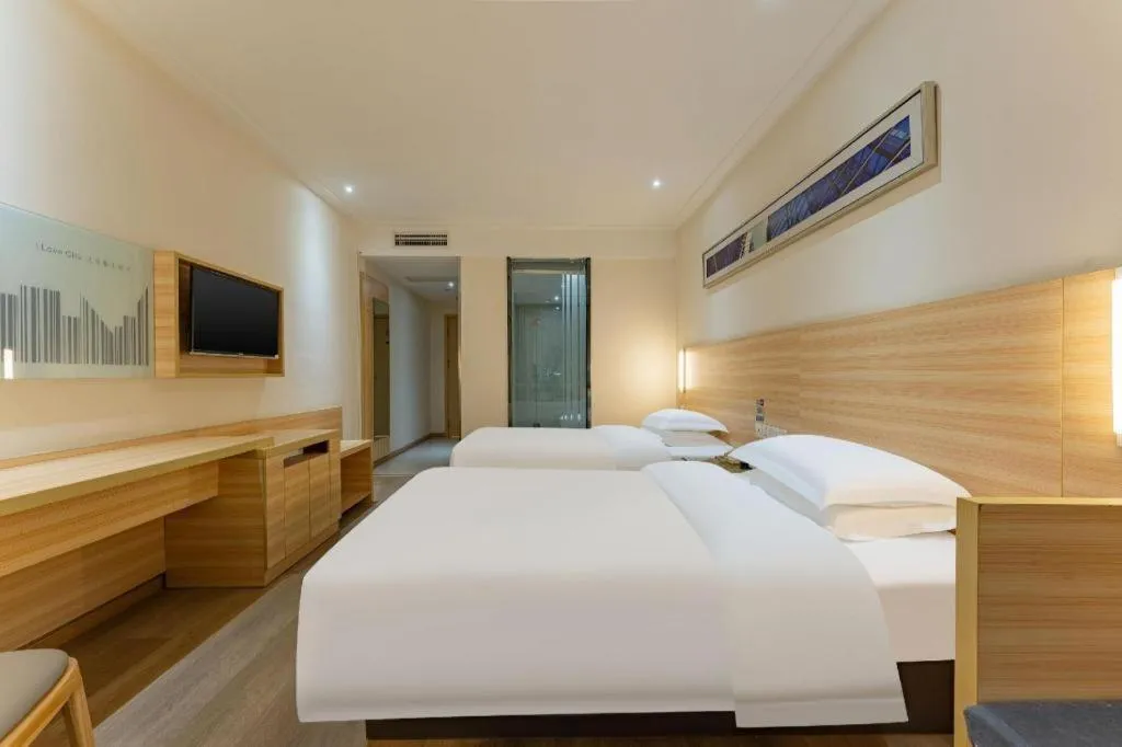 Bed in City Comfort Inn Enshi Shizhou Avenue