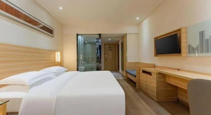 Bed in City Comfort Inn Enshi Shizhou Avenue