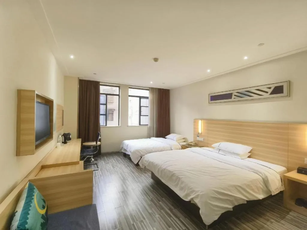 Bed in City Comfort Inn Enshi Shizhou Avenue