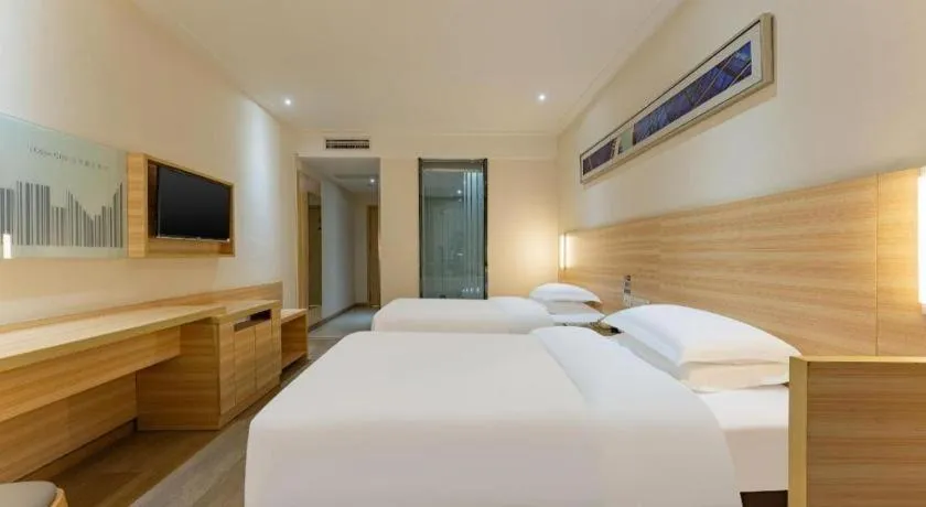 Bed in City Comfort Inn Enshi Shizhou Avenue