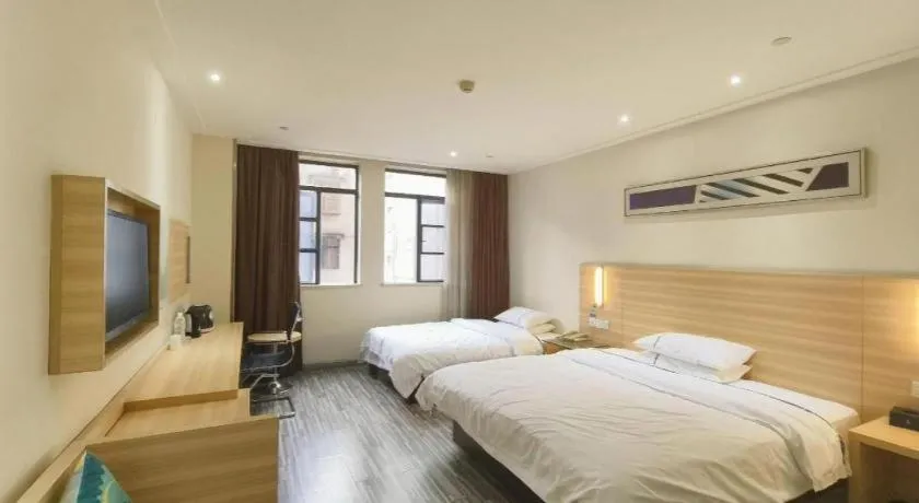 Bed in City Comfort Inn Enshi Shizhou Avenue