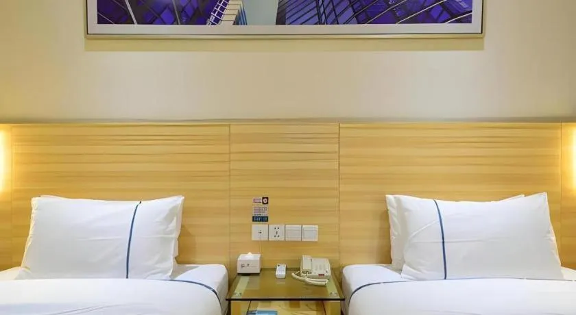 Bed in City Comfort Inn Enshi Shizhou Avenue