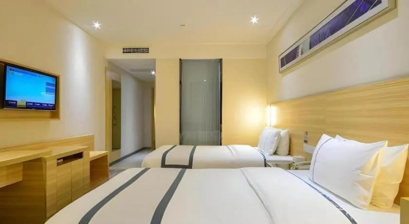 Bed in City Comfort Inn Enshi Shizhou Avenue