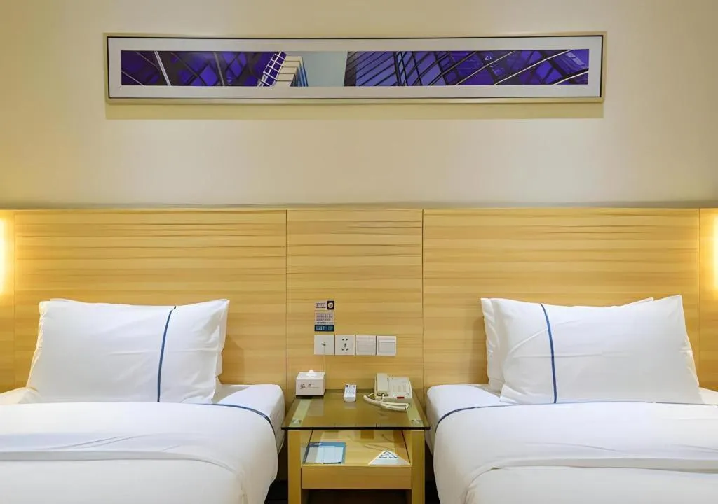 Bed in City Comfort Inn Enshi Shizhou Avenue