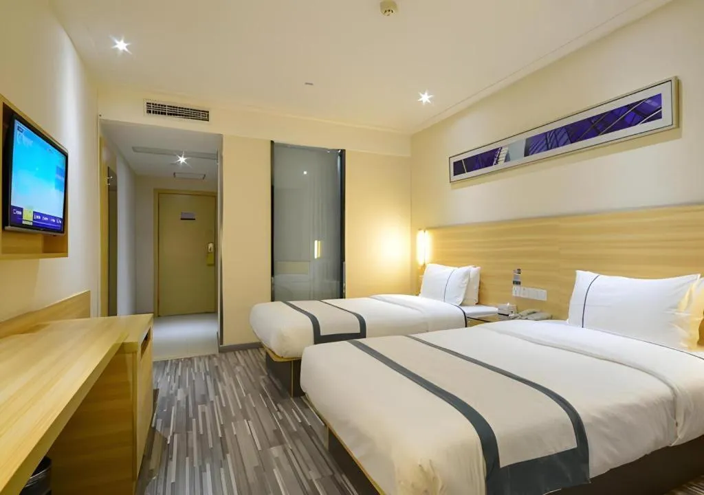 Bed in City Comfort Inn Enshi Shizhou Avenue