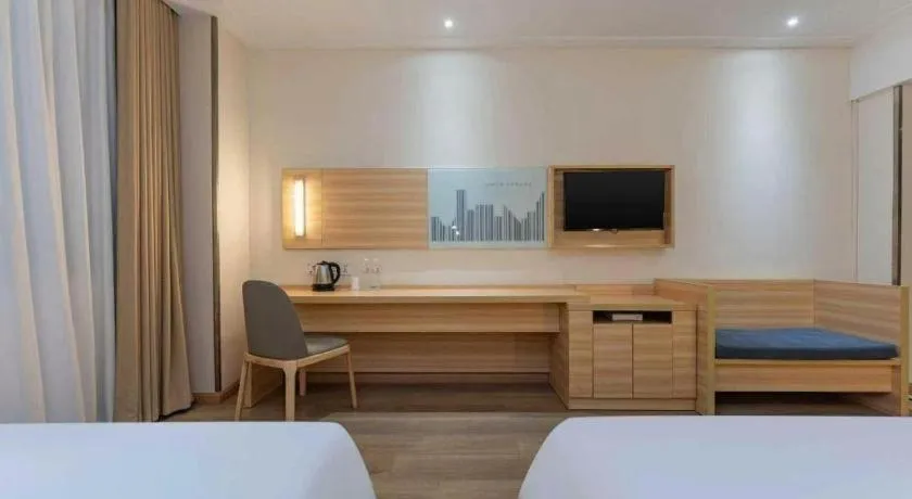 Bed in City Comfort Inn Enshi Shizhou Avenue