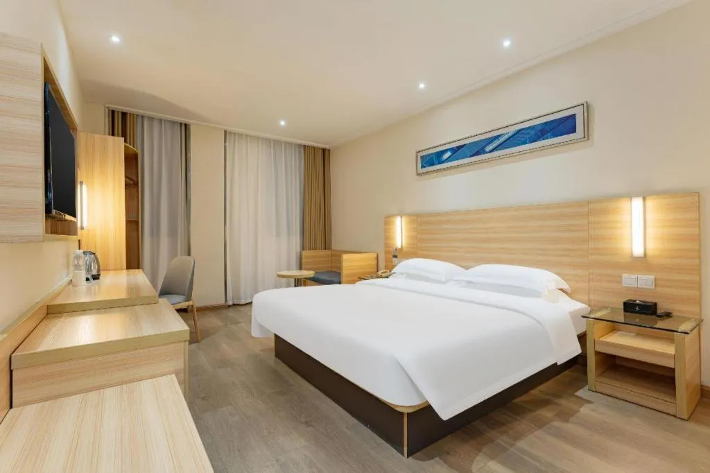 Bed in City Comfort Inn Enshi Shizhou Avenue