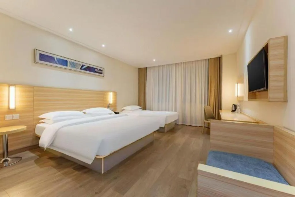 Bed in City Comfort Inn Enshi Shizhou Avenue