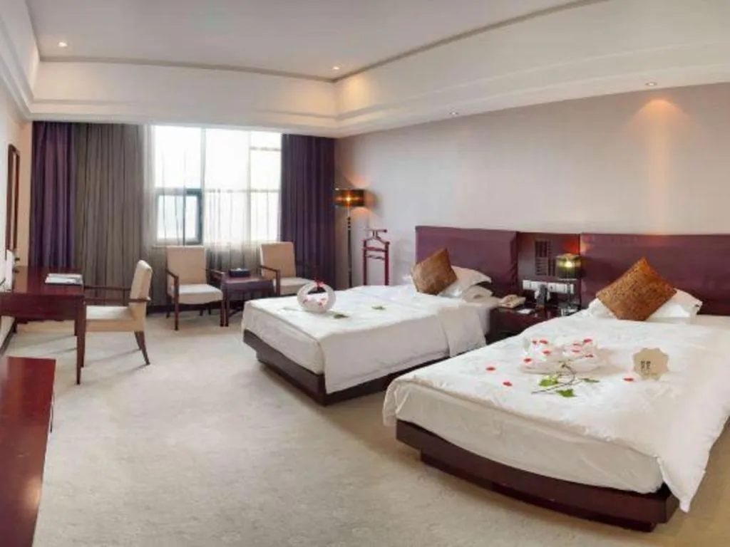 Bed in Kunming Wenhui Hotel