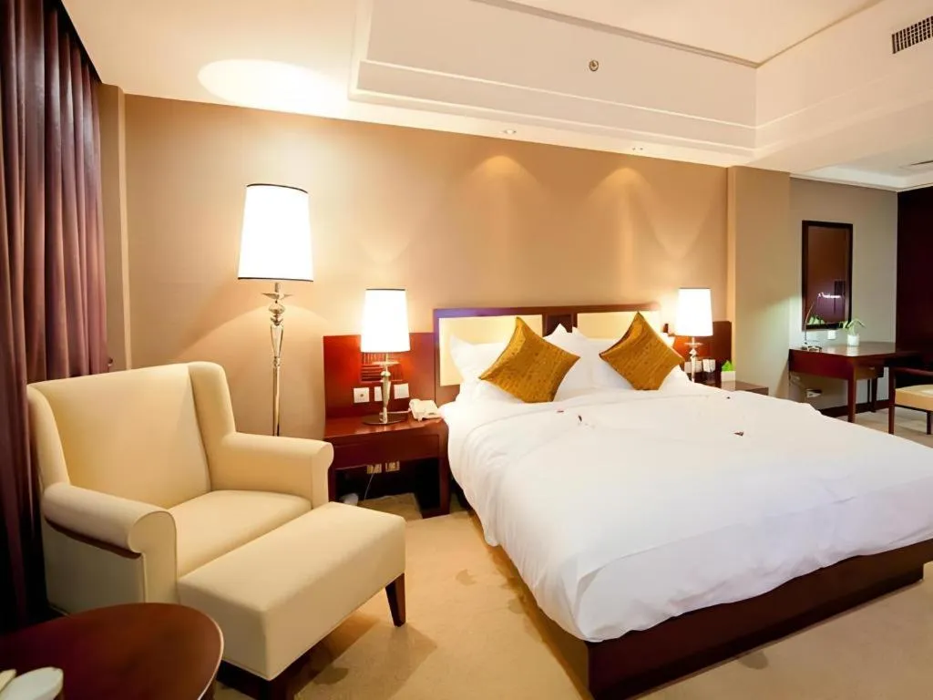 Bed in Kunming Wenhui Hotel