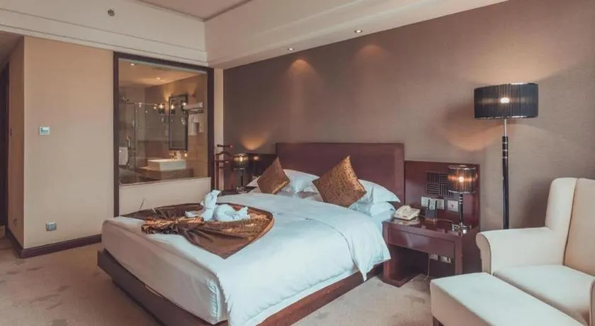 Bed in Kunming Wenhui Hotel