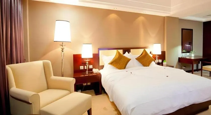 Bed in Kunming Wenhui Hotel