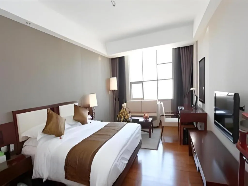 Bed in Kunming Wenhui Hotel