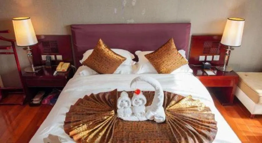 Bed in Kunming Wenhui Hotel