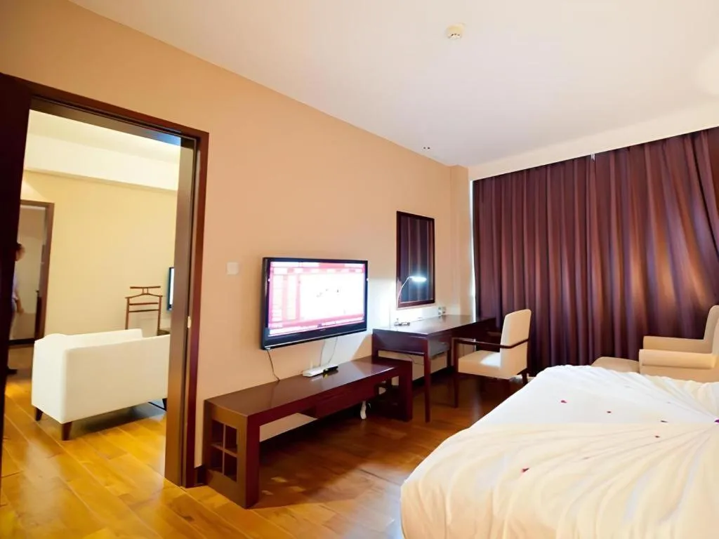 Bed in Kunming Wenhui Hotel