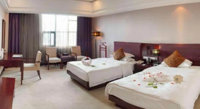 Bed in Kunming Wenhui Hotel