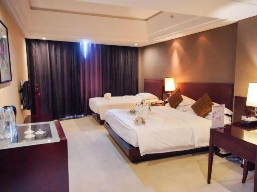 Bed in Kunming Wenhui Hotel