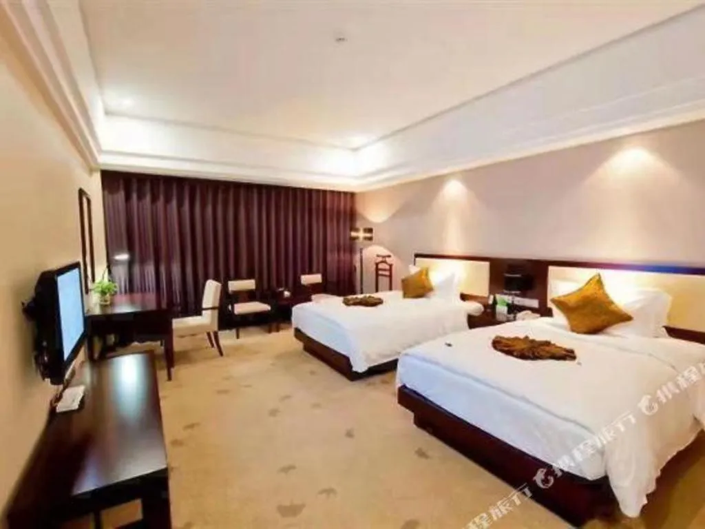 Bed in Kunming Wenhui Hotel