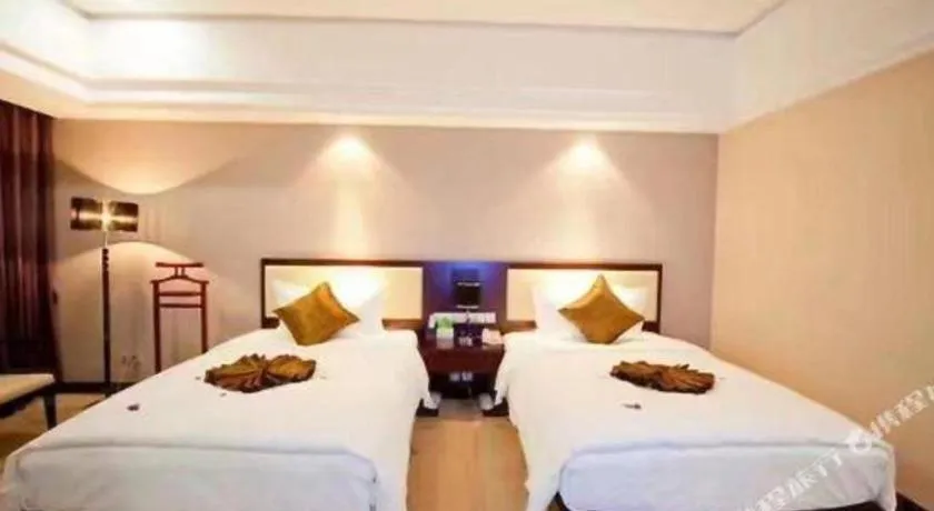 Bed in Kunming Wenhui Hotel