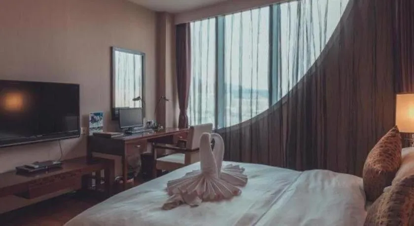 Bed in Kunming Wenhui Hotel