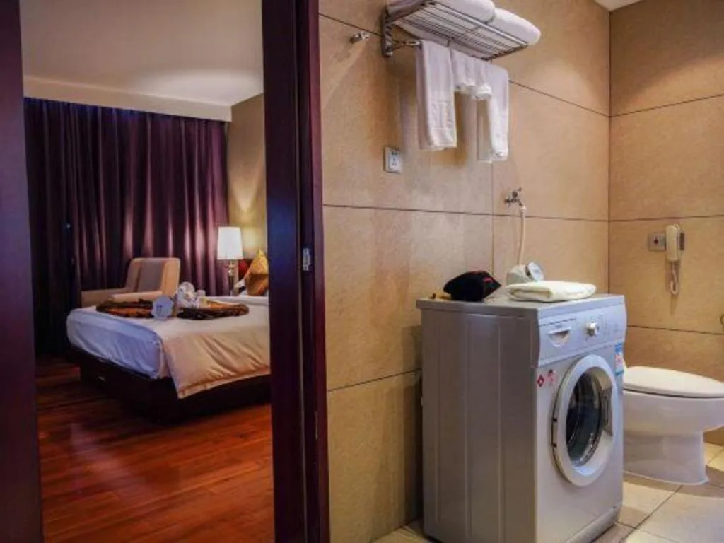 Bed in Kunming Wenhui Hotel