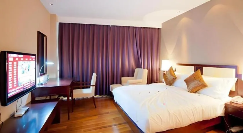 Bed in Kunming Wenhui Hotel