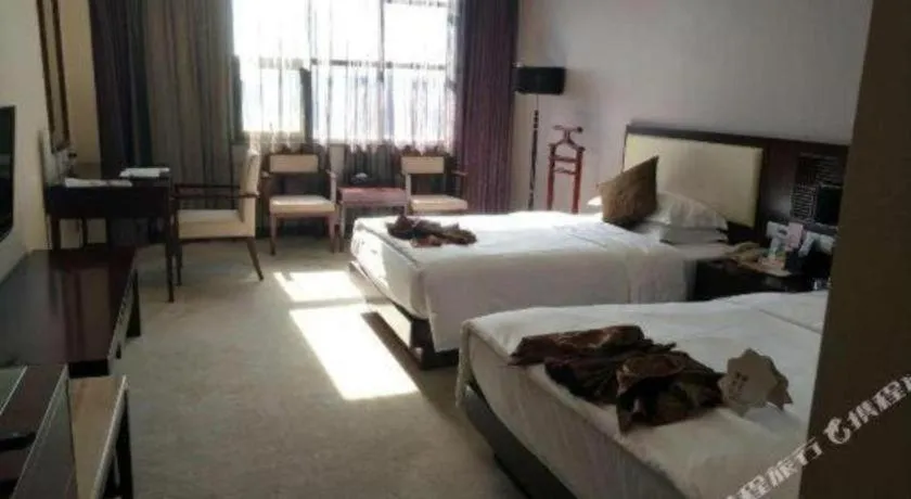 Bed in Kunming Wenhui Hotel