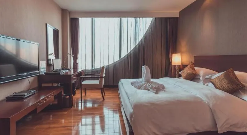 Bed in Kunming Wenhui Hotel