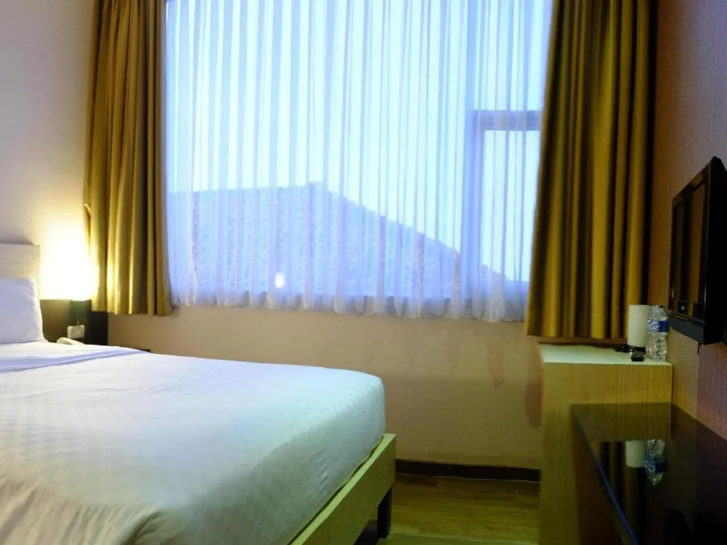 Bed in Lotus Hotel Subang