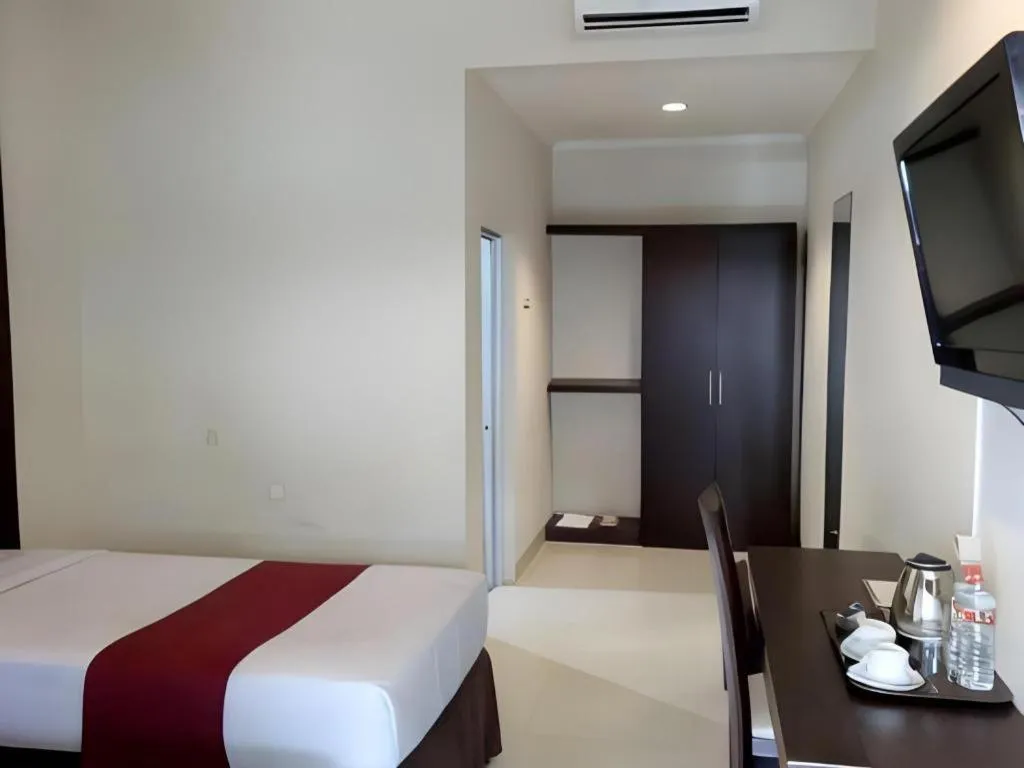 Bed in The Margangsa Hotel