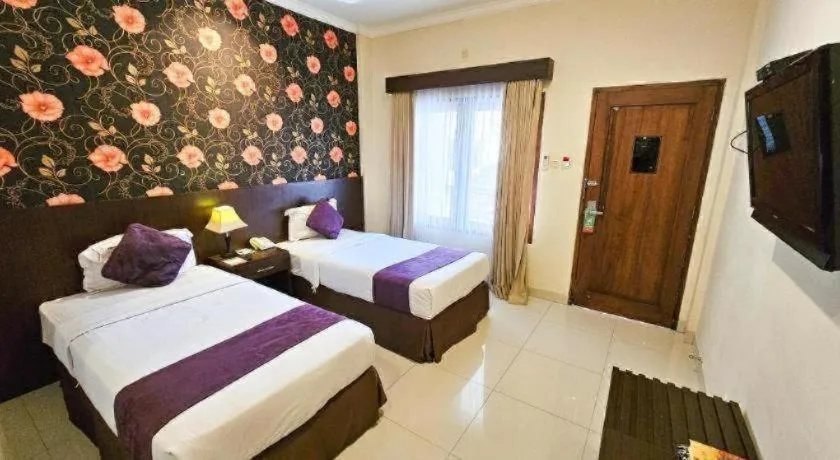 Bed in The Margangsa Hotel