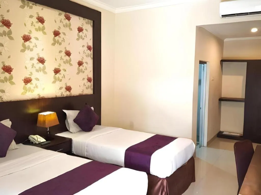 Bed in The Margangsa Hotel