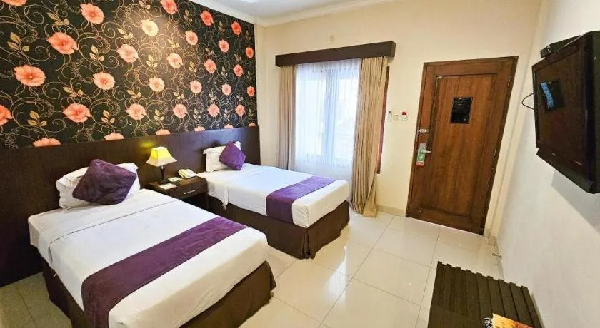 Bed in The Margangsa Hotel