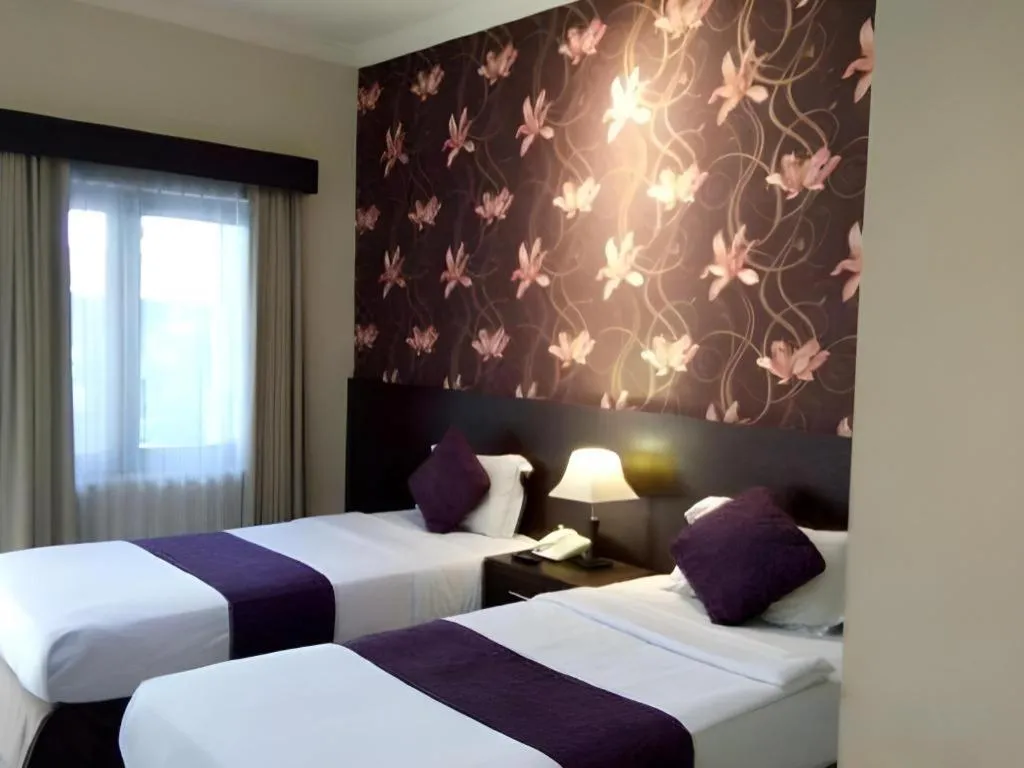 Bed in The Margangsa Hotel