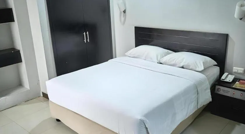 Bed in Hotel Celebes