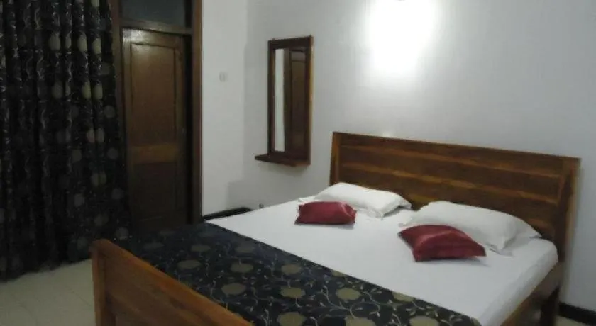 Bed in Seven Flowers Hotel