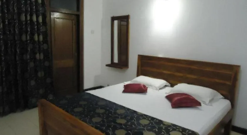 Bed in Seven Flowers Hotel