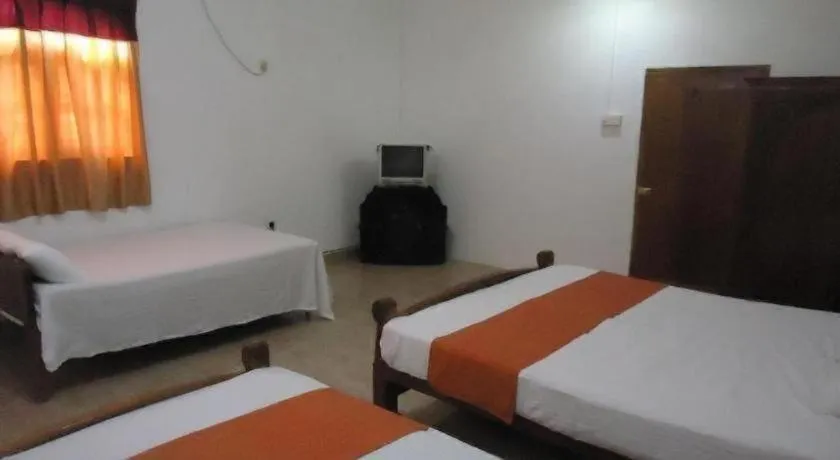 Bed in Seven Flowers Hotel