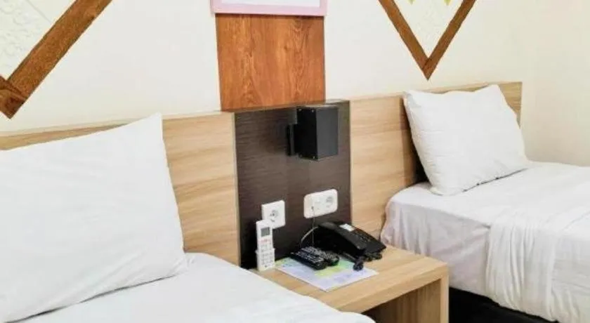 Bed in GARDEN HOTEL MAJALENGKA