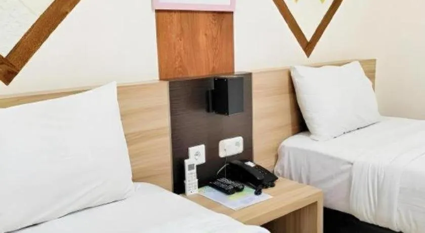 Bed in GARDEN HOTEL MAJALENGKA