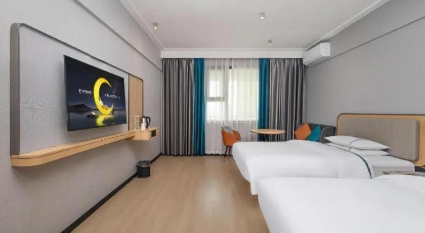 Bed in City Comfort Inn Yongzhou Jinshuiwan