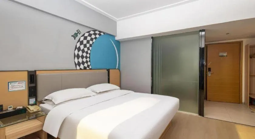 Bed in City Comfort Inn Yongzhou Jinshuiwan