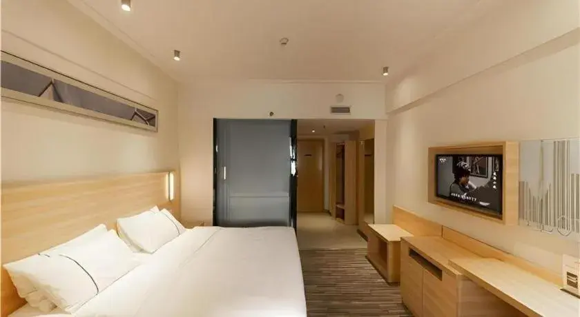 Bed in City Comfort Inn Yongzhou Jinshuiwan Bed in City Comfort Inn Yongzhou Jinshuiwan